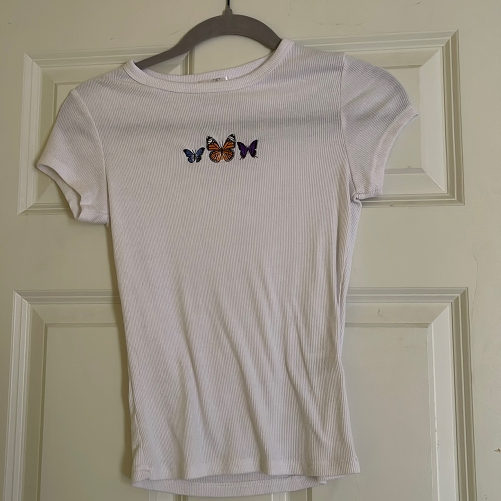 White butterfly tee